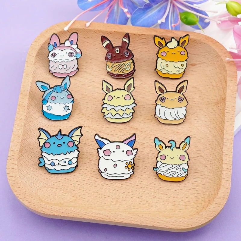 AA 9Pcs Anime Cute Elf Eevee Enamel Pins Cartoon Fox Cake Monster Brooch Fashion Woman Men Lapel Badge Jewelry Gifts For Friends